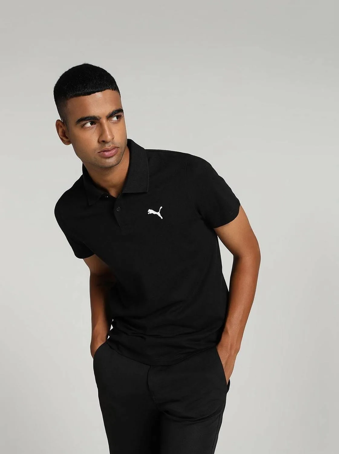 PUMA Men Solid Polo Neck Pure Cotton Black T-Shirt at ₹529