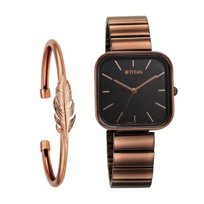 Titan Purple Stackables Quartz Analog Black Dial Metallic Brown Stainless Steel Strap at ₹6,540